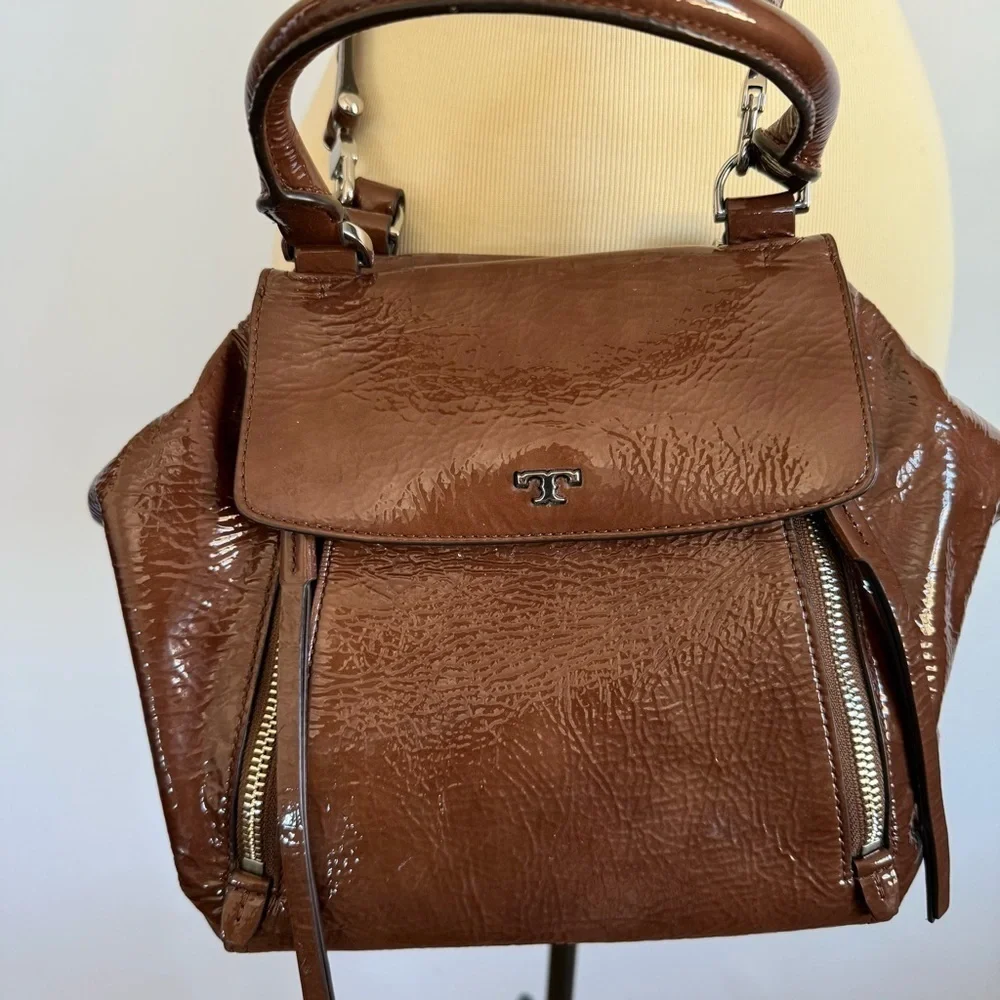 Tory Burch half moon patent leather brown purse with crossbody strap